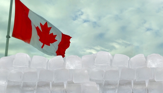 wall of ice flying the Canadian Flag